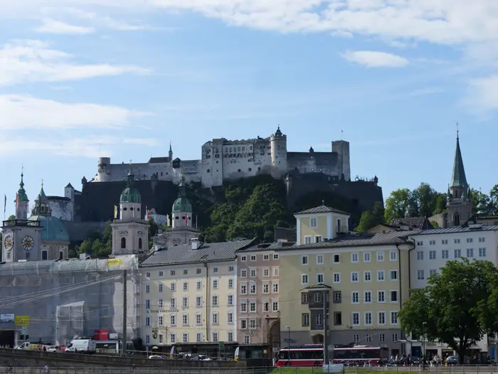 Hohensalzburg Fortress above the historic rooftops of Salzburg.
